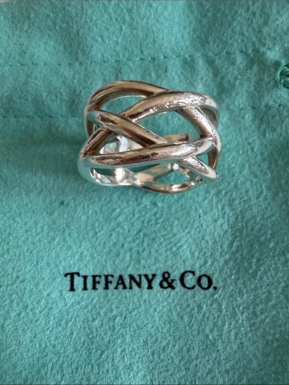 Tiffany & Co. Silver braided Celtic Crossover Band sterling silver with pouch